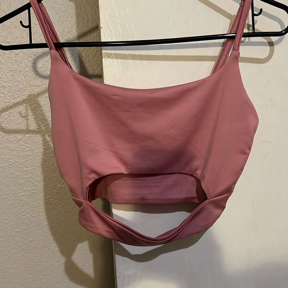 Pink cropped tank with slit in front